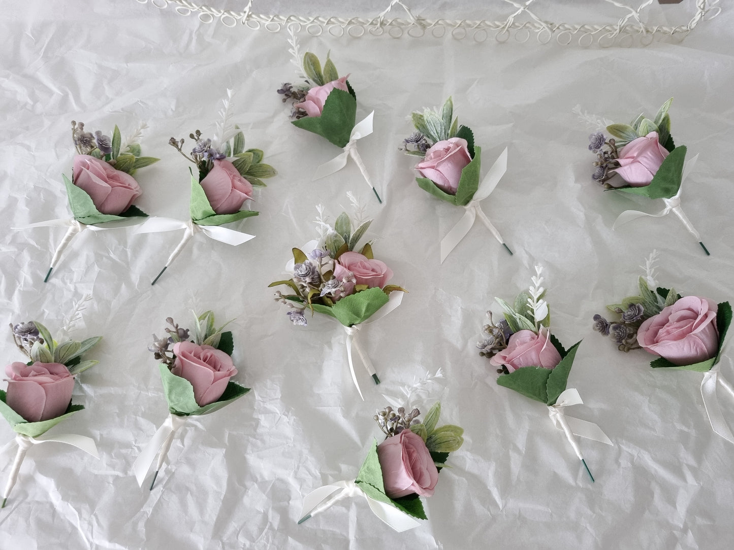 Dusty pink buttonholes