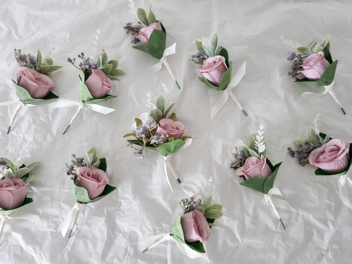 Dusty pink buttonholes
