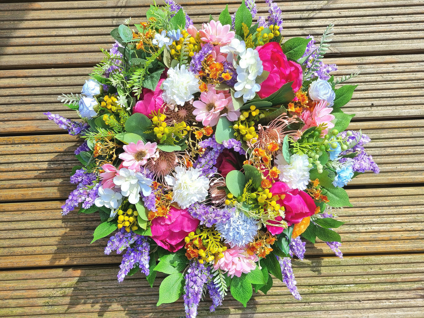 Vibrant artificial flowers wreath