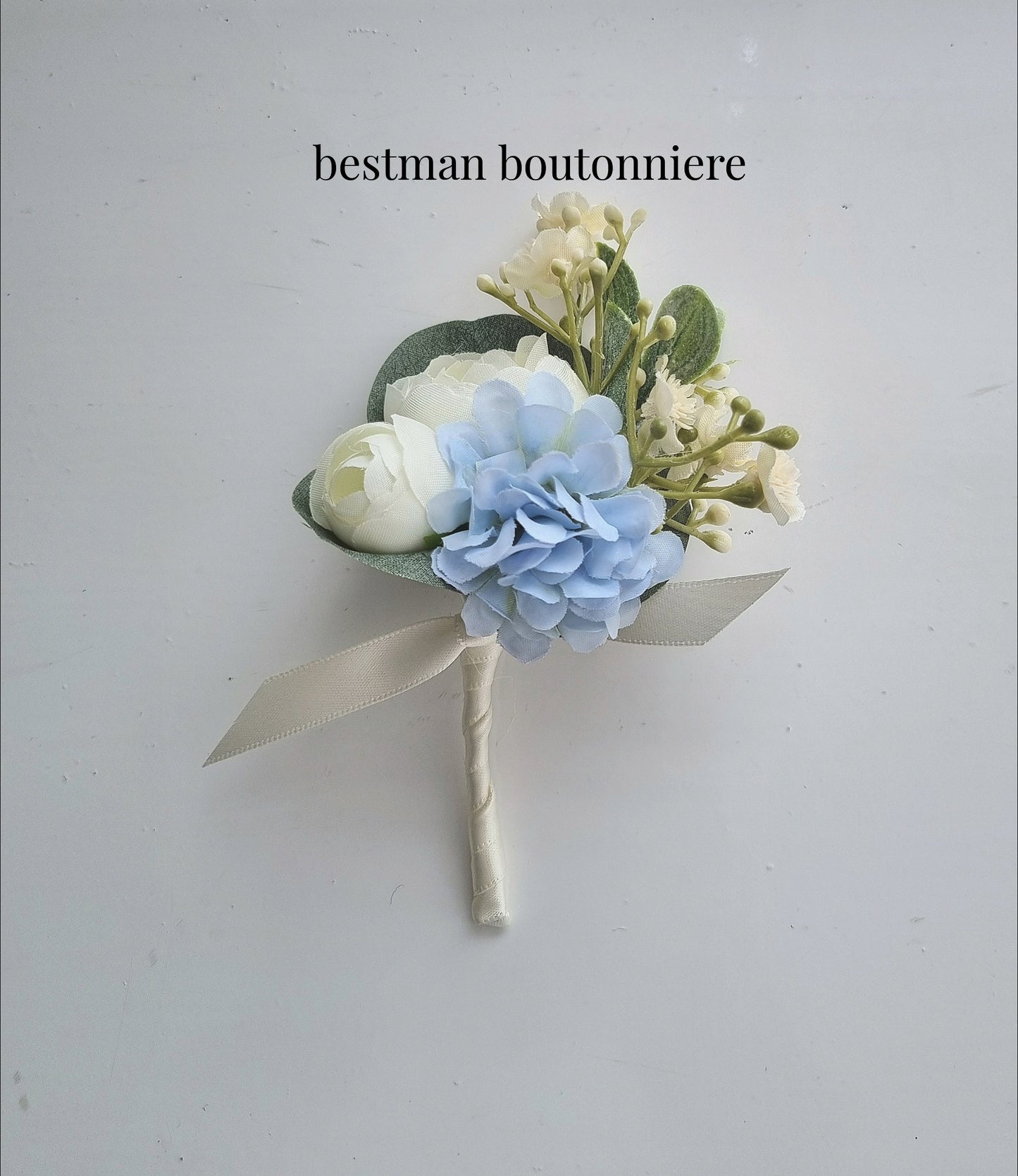 Dusty blue & ivory buttonholes & dress corsage