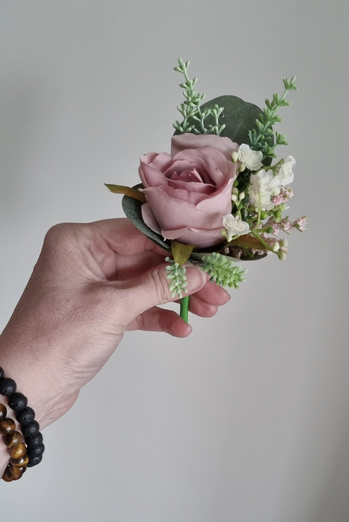 Mauve buttonholes & wrist corsage