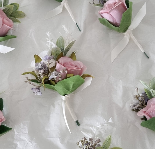 Dusty pink buttonholes