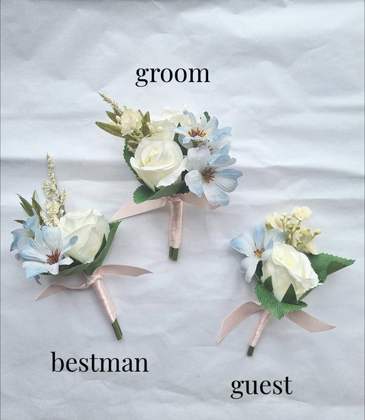 Baby pink, light blue & ivory buttonholes.